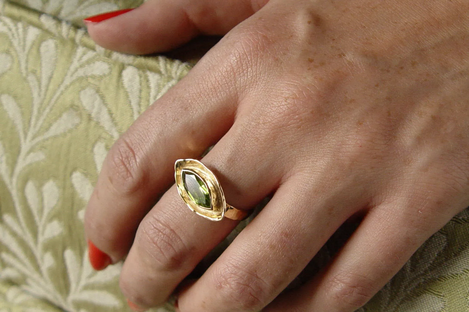 RG1040 Gold Ring with Marquise Peridot